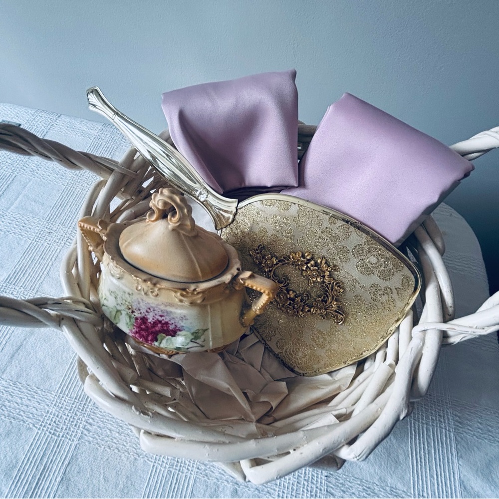 Feminine gift basket with vintage mirror, dish and 2 satin pillow cases